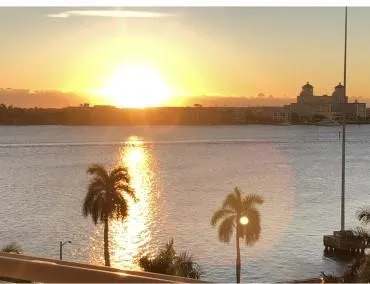 a view of a room with water heater and racks