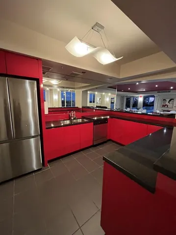 a bedroom with a bed and hallway