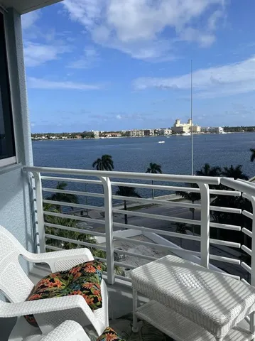 a living room with a couch and a large window