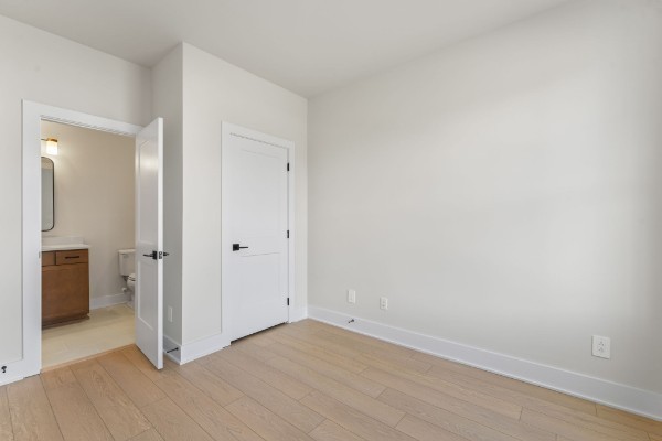 826 Silva Loop Mount Juliet, TN 37122 - Photo 18 of 24 a view of a room with wooden floor and a bathroom