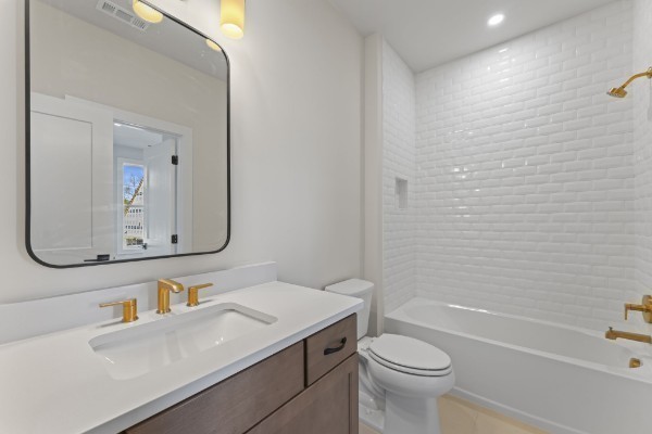 826 Silva Loop Mount Juliet, TN 37122 - Photo 20 of 24 a bathroom with a sink a toilet and shower