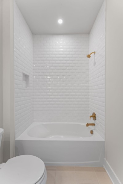 826 Silva Loop Mount Juliet, TN 37122 - Photo 22 of 24 a bathroom with a bathtub and a toilet