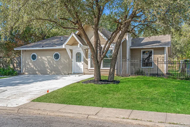 a house view with a garden space