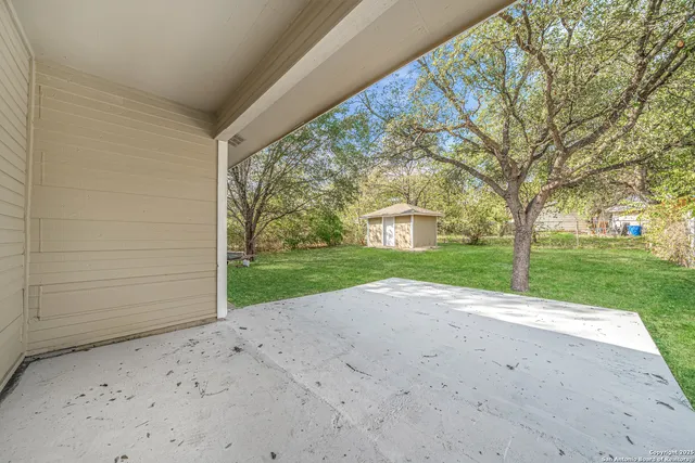 a view of a house with a big yard