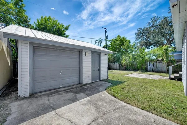 a view of a back yard of the house