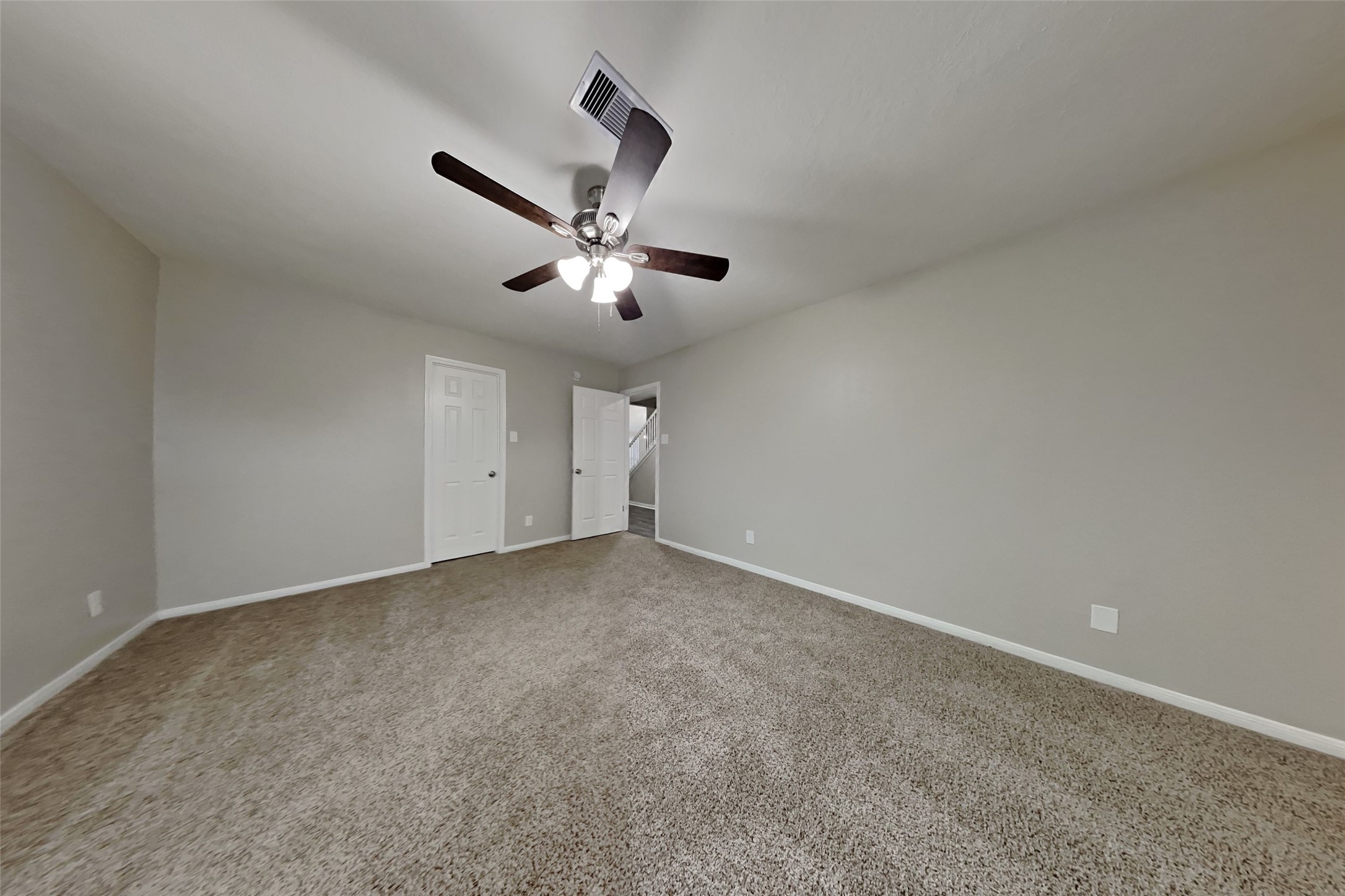 6818 White Tail Drive Spring, TX 77379 - Photo 13 of 24 an empty room with a ceiling fan and window