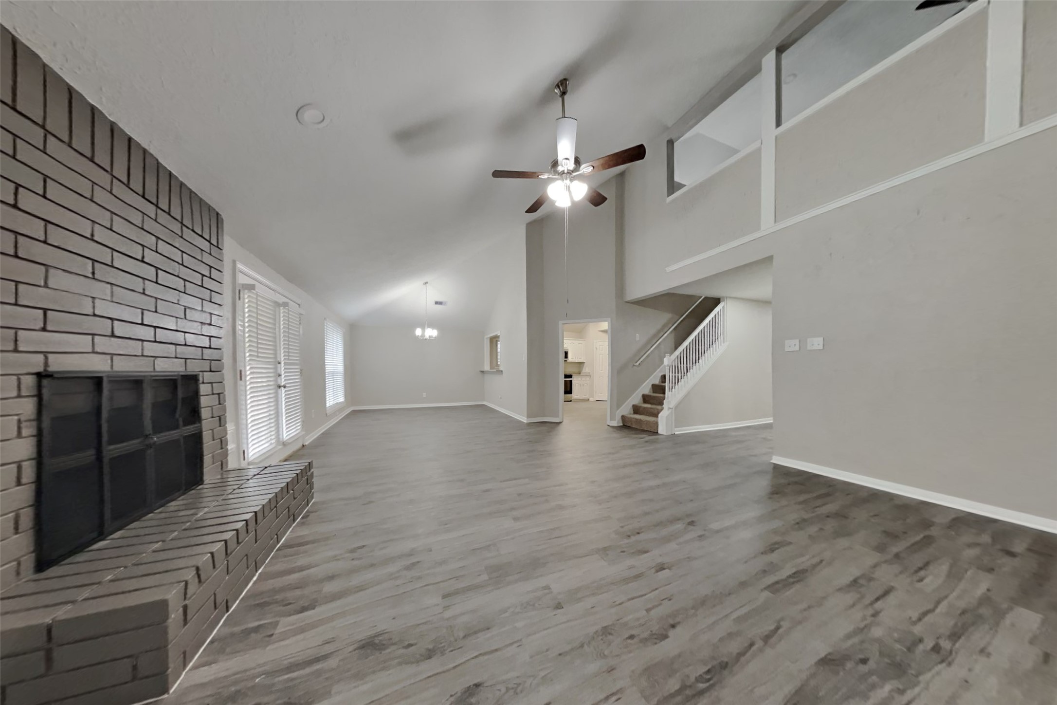 6818 White Tail Drive Spring, TX 77379 - Photo 5 of 24 a view of empty room with wooden floor and ceiling fan