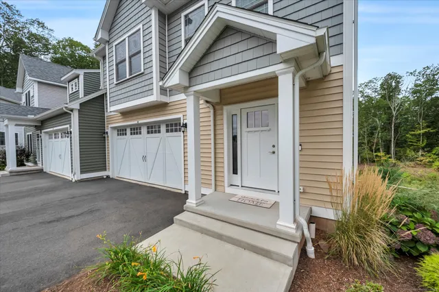 front view of a house with a small porch