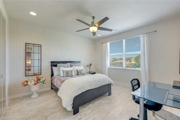 a view of a patio with couches chairs and a table