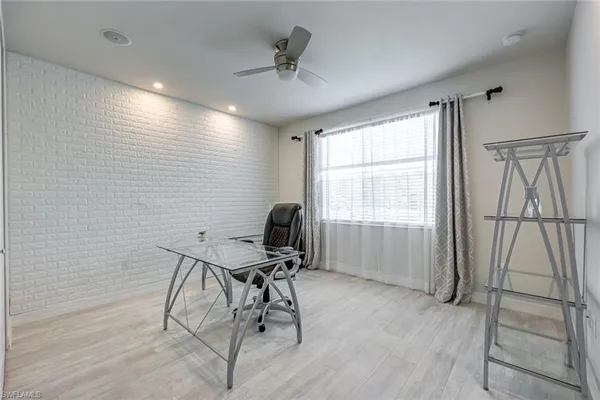 a view of a lake with couches and city view