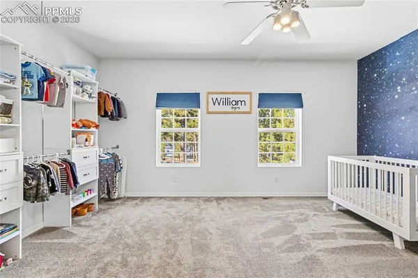 a view of a hallway with workspace