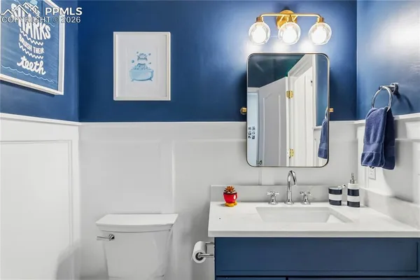 a bedroom with a bed and a cabinets