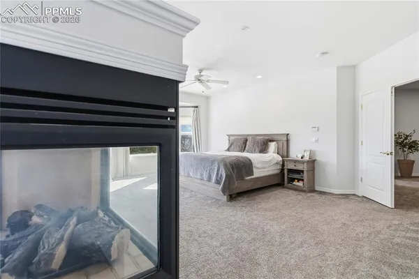 a bedroom with a bed and dresser