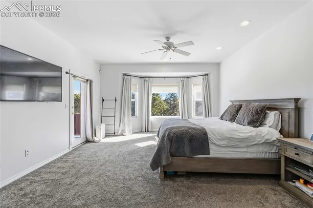 a bathroom with a tub and shower