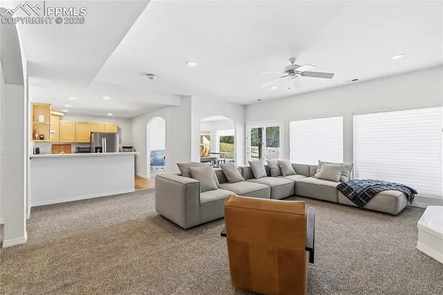 a kitchen with stainless steel appliances a refrigerator and a stove top oven