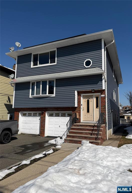 79 Hunter Street Lodi, NJ 07644 - Photo 1 of 11 a front view of a house with a yard