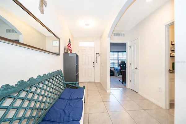 a living room with furniture and a couch