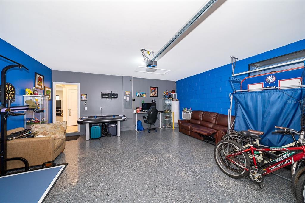 2795 Harmonia Hammock Road St. Cloud, FL 34773 - Photo 22 of 30 a living room with furniture and a couch