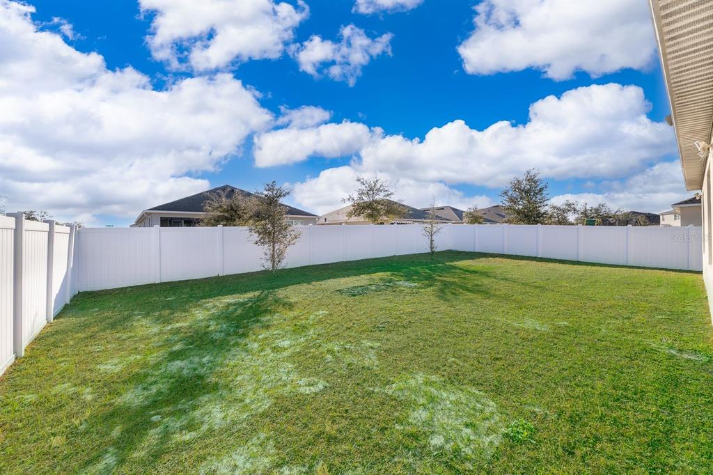 2795 Harmonia Hammock Road St. Cloud, FL 34773 - Photo 23 of 30 a view of a backyard