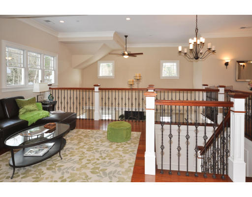 1 Ann's Way Dover, MA 02030 - Photo 17 of 26 a living room with furniture a chandelier and a dining table