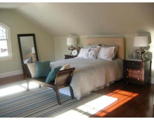 1 Ann's Way Dover, MA 02030 - Photo 21 of 26 a bedroom with a bed and wooden floor