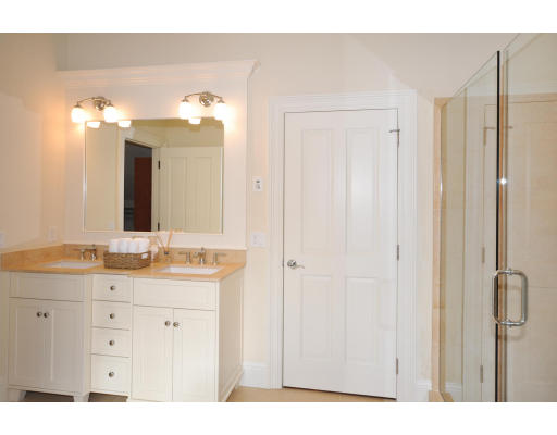 1 Ann's Way Dover, MA 02030 - Photo 24 of 26 a bathroom with a granite countertop sink two mirror and a