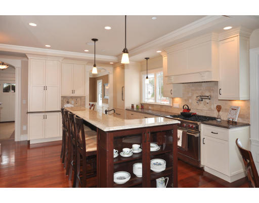 1 Ann's Way Dover, MA 02030 - Photo 9 of 26 a kitchen with stainless steel appliances kitchen island granite countertop a sink and cabinets