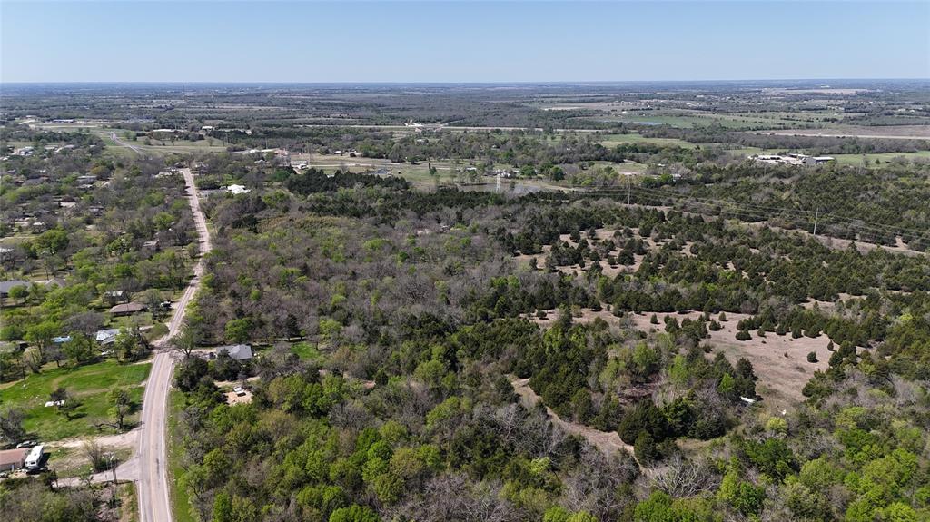 390 Bishop Street Commerce, TX 75428 - Photo 3 of 3 an aerial view of multiple house
