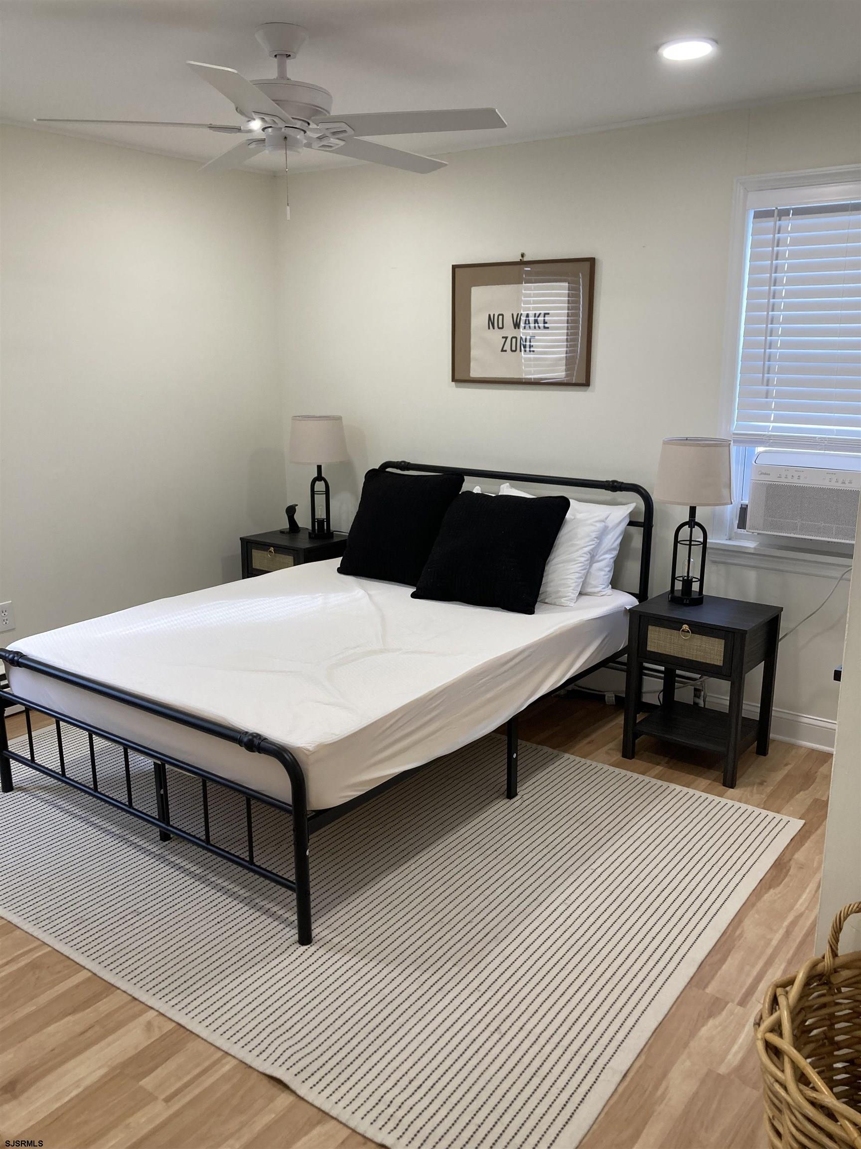 271 38th Street South, Unit A / B Brigantine, NJ 08203 - Photo 3 of 7 a living room with furniture and a table
