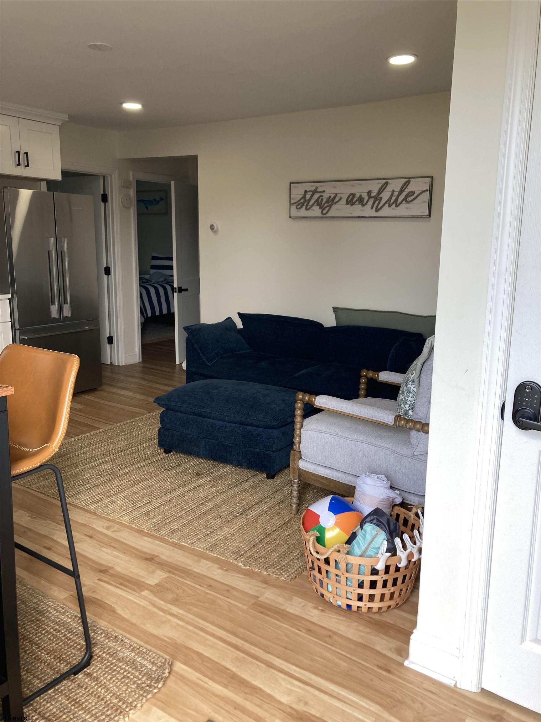 271 38th Street South, Unit A / B Brigantine, NJ 08203 - Photo 4 of 7 a living room with furniture and a couch