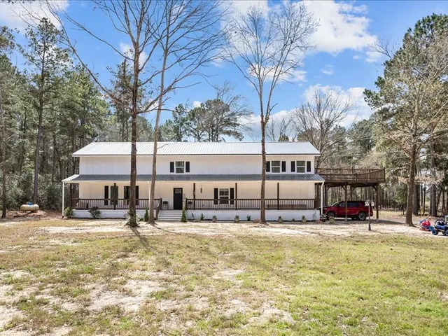 a front view of building with sign board