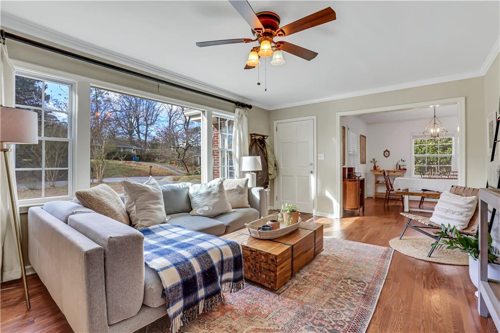 607 Webster Drive Decatur, GA 30033 - Photo 1 of 1 a living room with furniture and a large window
