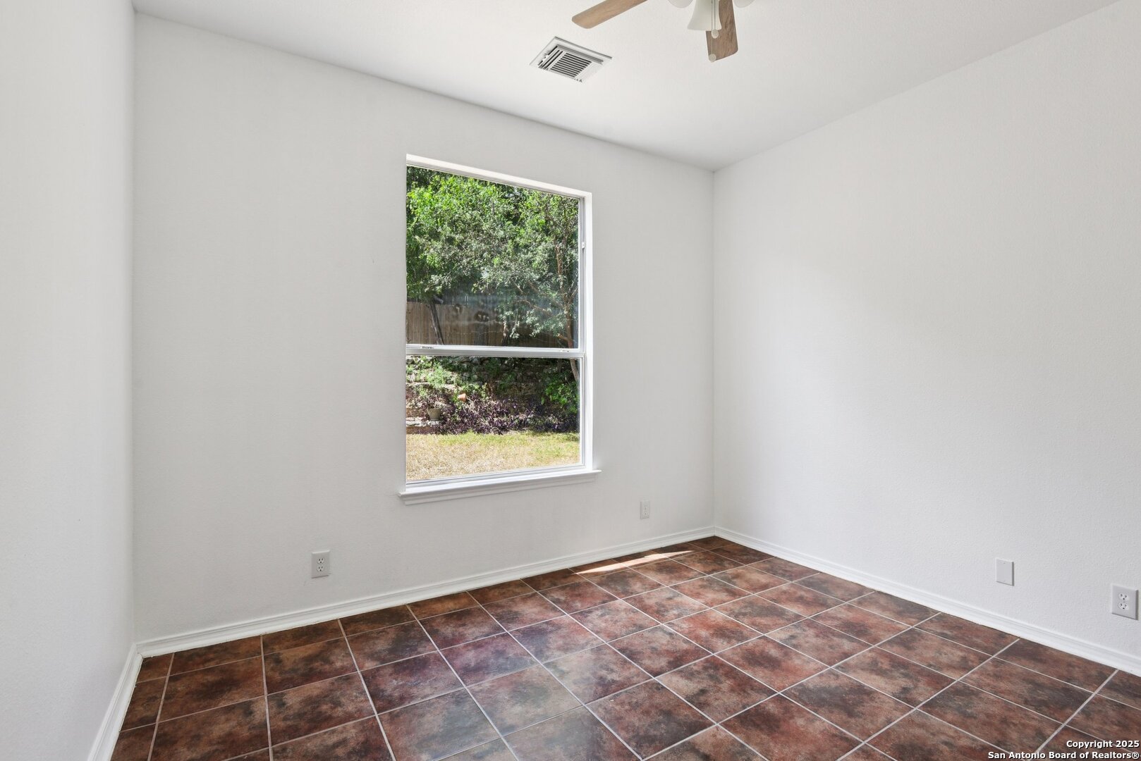 21510 Rio Colorado San Antonio, TX 78259 - Photo 13 of 42 an empty room with a window