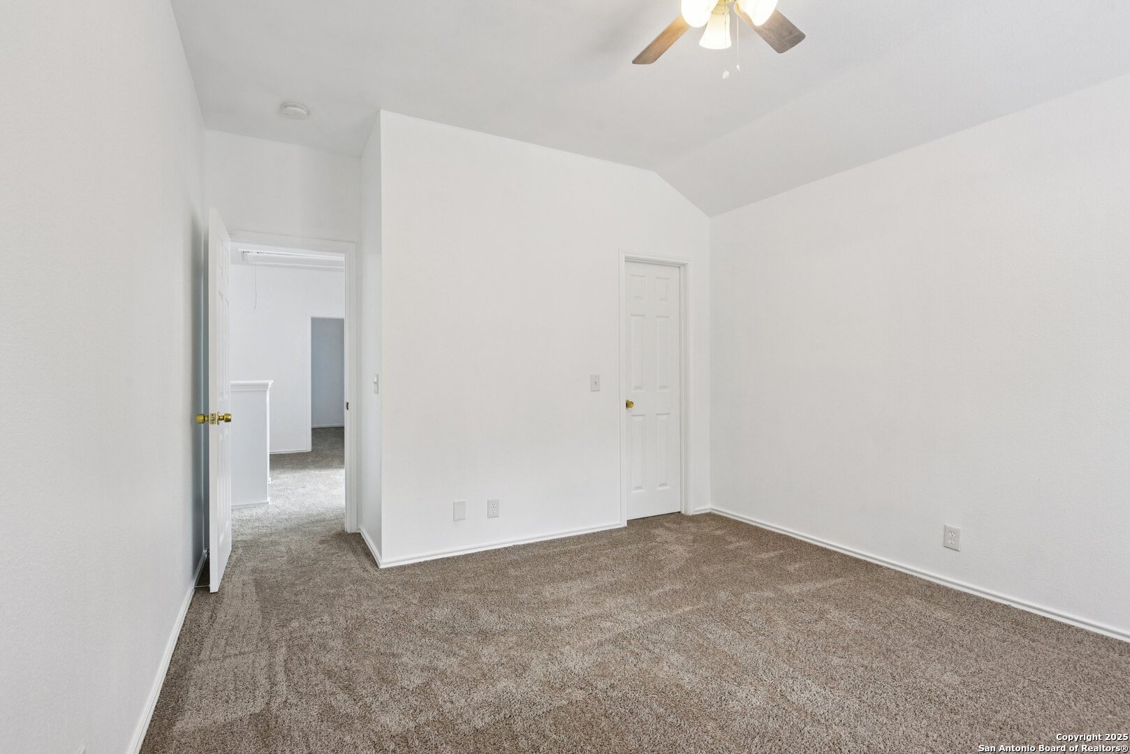 21510 Rio Colorado San Antonio, TX 78259 - Photo 29 of 42 an empty room with a chandelier fan