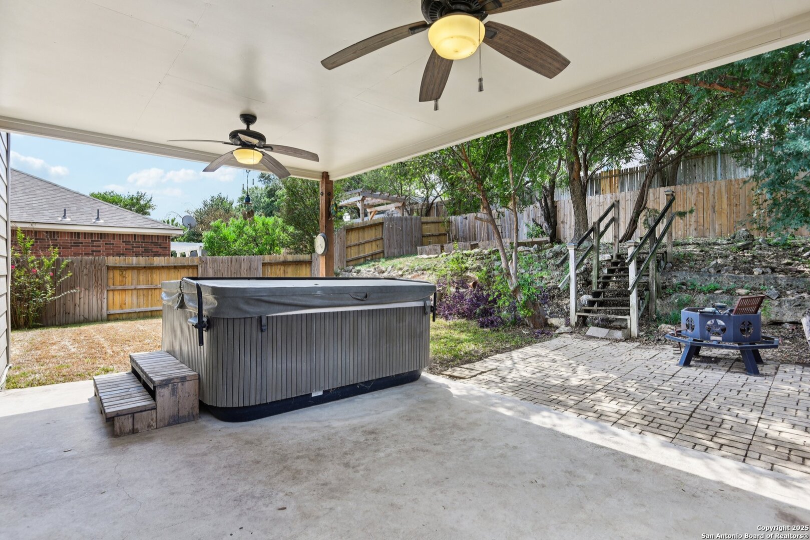 21510 Rio Colorado San Antonio, TX 78259 - Photo 35 of 42 a view of a patio with a table and chairs