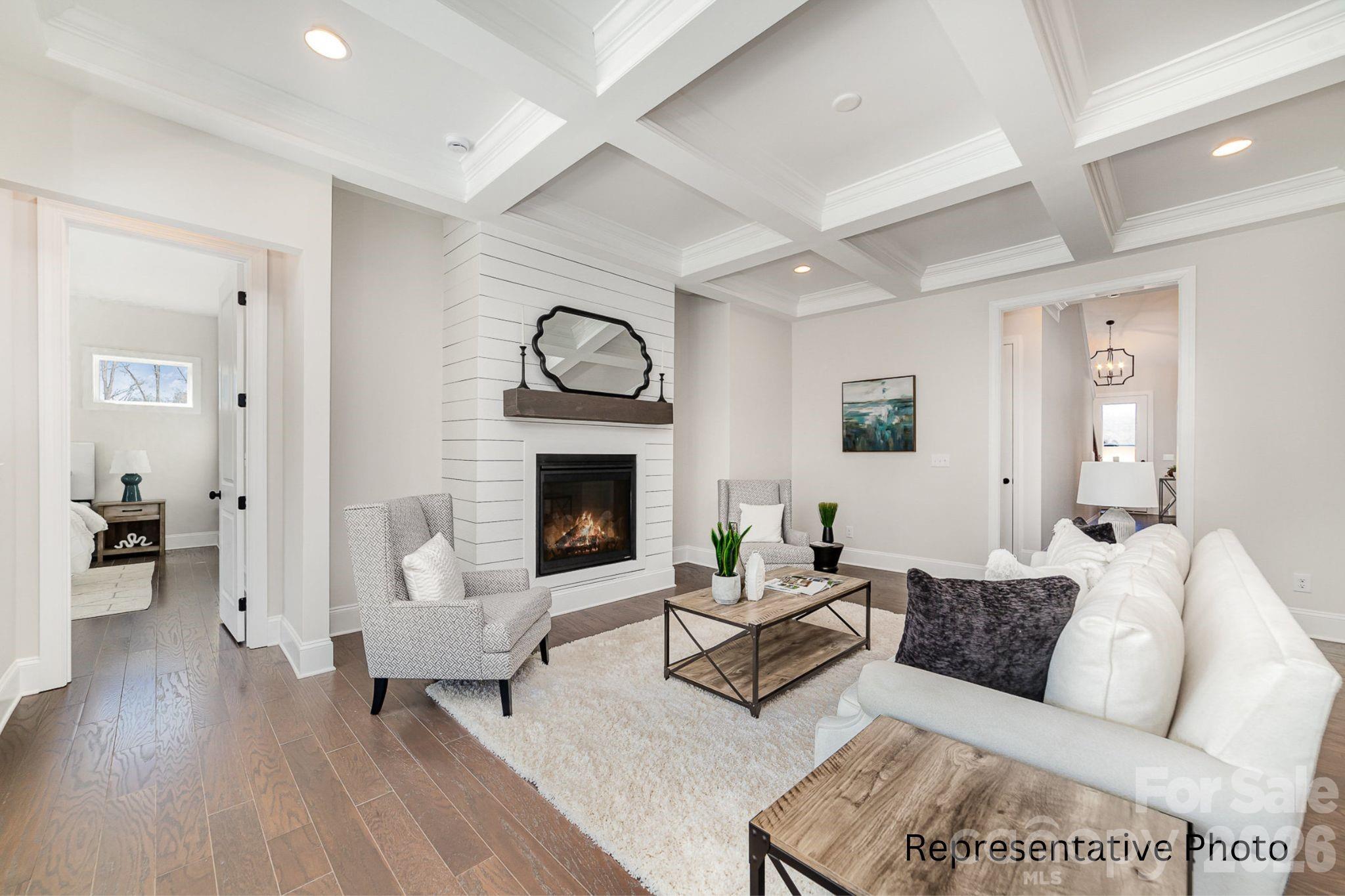 0 Rivendell Road, Unit 40 Denver, NC 28037 - Photo 6 of 23 a living room with furniture and a fireplace