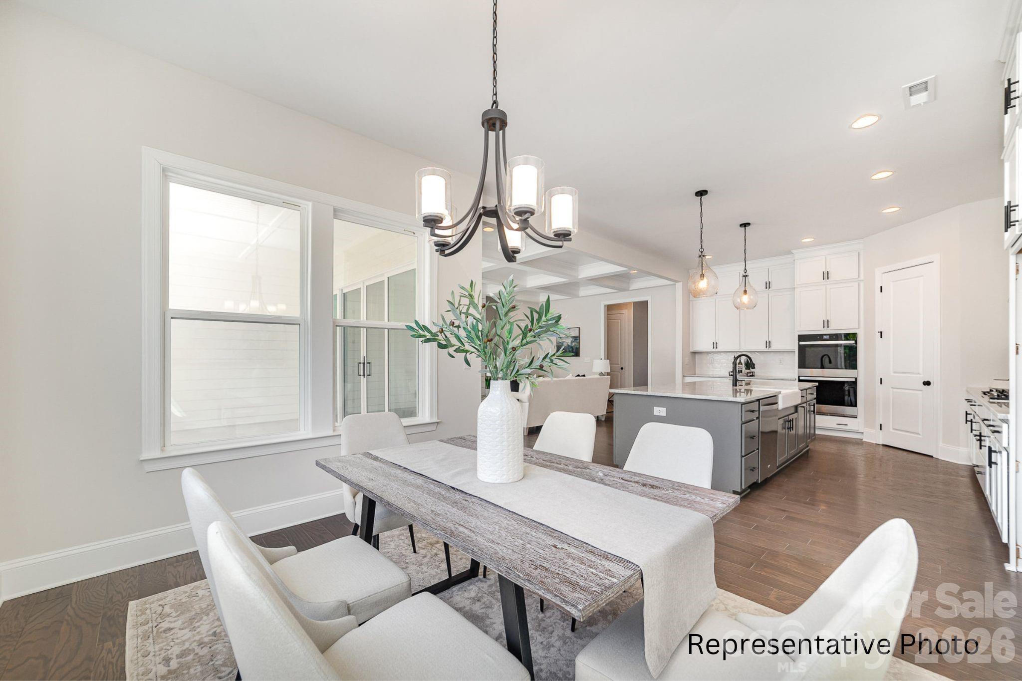 0 Rivendell Road, Unit 40 Denver, NC 28037 - Photo 7 of 23 a dining room with furniture and window