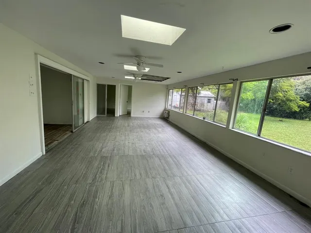 an empty room with windows