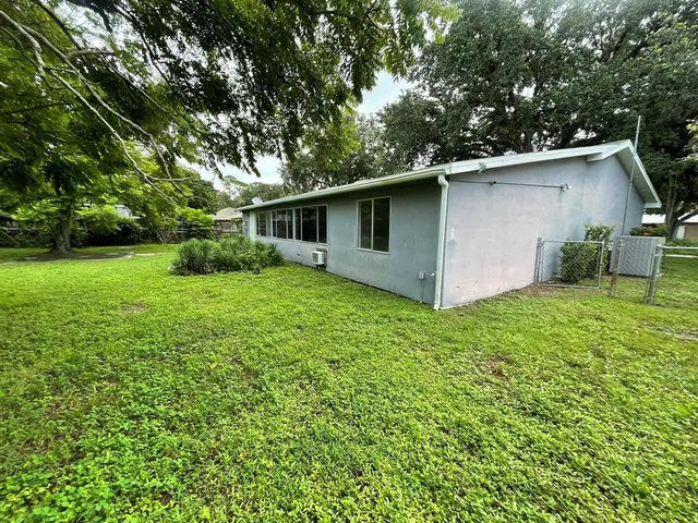 a view of a backyard with a garden