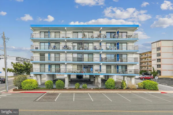 a front view of a building with street view