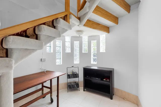 a view of workspace with flat screen tv