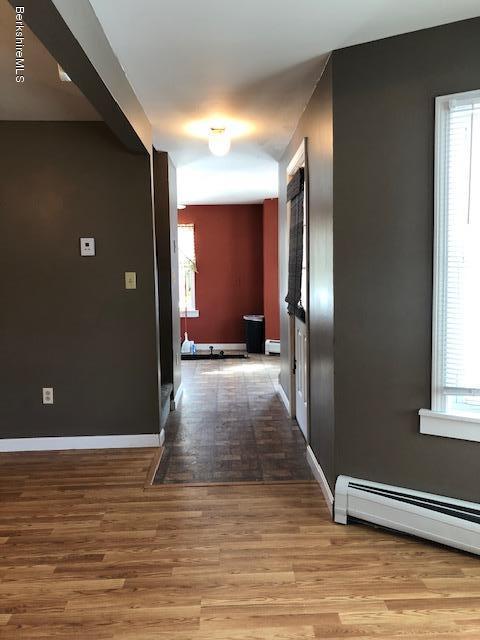 5 Henderson Road Clarksburg, MA 01247 - Photo 9 of 20 living room to kitchen