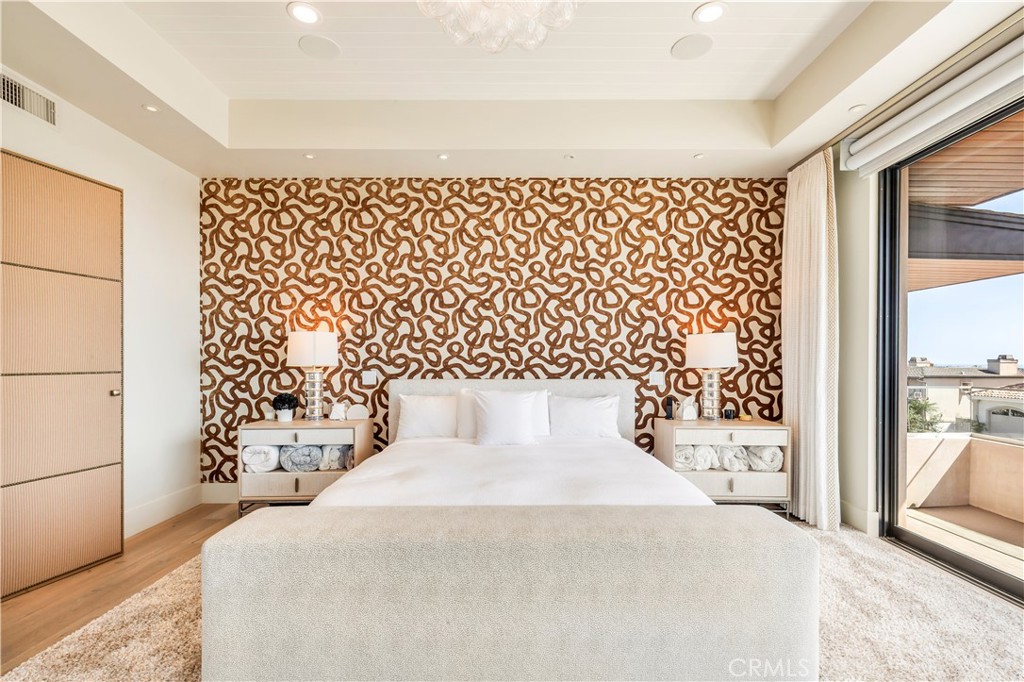 660 Kings Road Newport Beach, CA 92663 - Photo 18 of 41 a bedroom with a bed and a window
