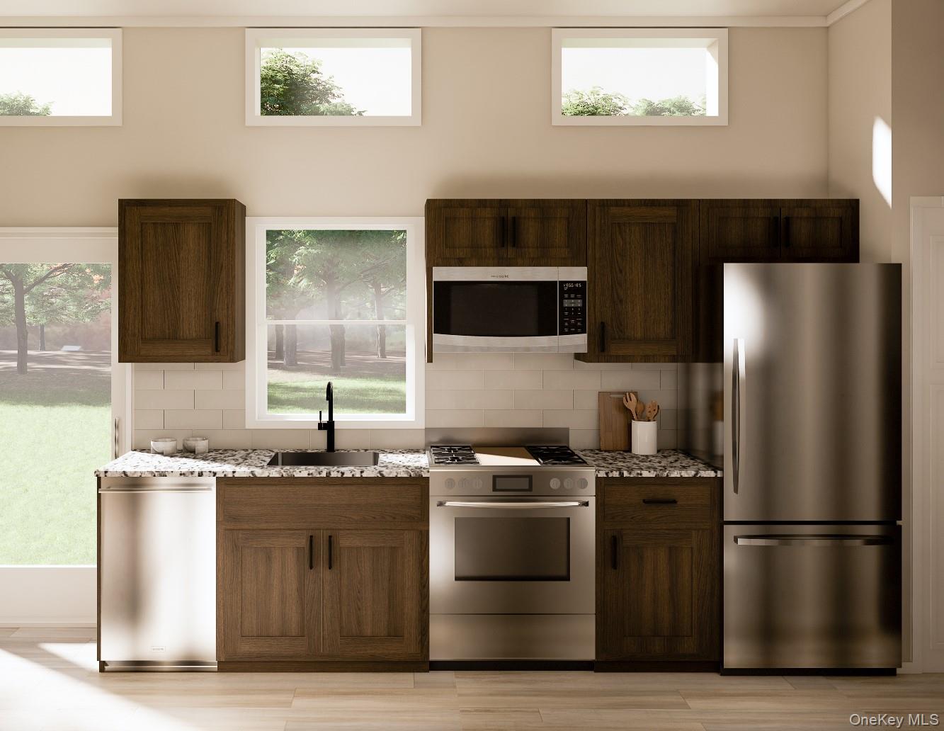 197 Wheeler Road, Unit 90 Florida, NY 10921 - Photo 8 of 37 Kitchen featuring appliances with stainless steel finishes, light stone countertops, natural light, and backsplash