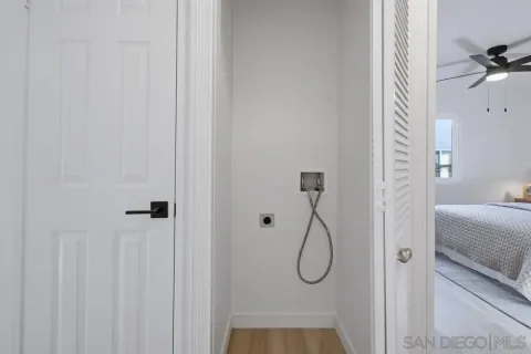 a bathroom with a glass shower door