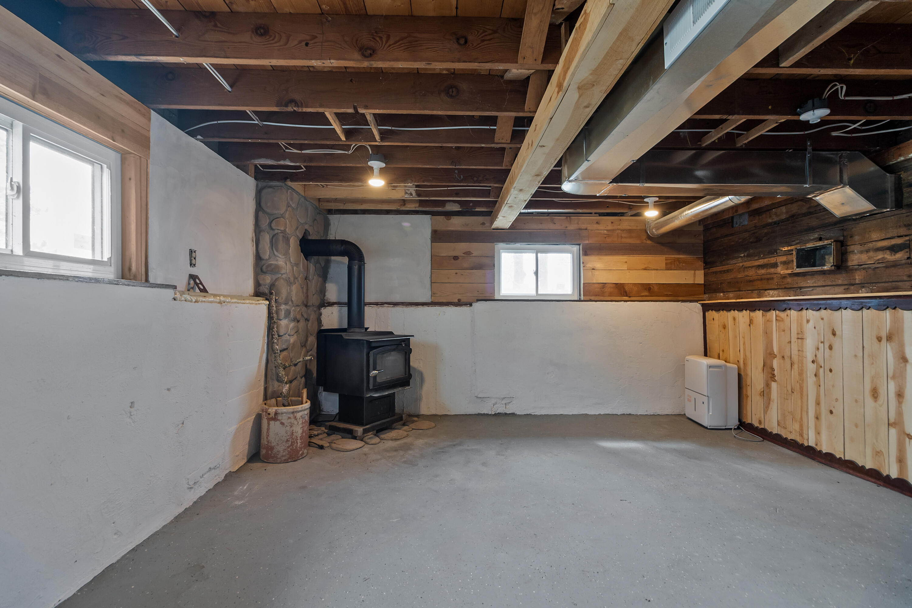 W6660 Willow Bend Road Walworth, WI 53184 - Photo 27 of 47 Basement w/free standing stove