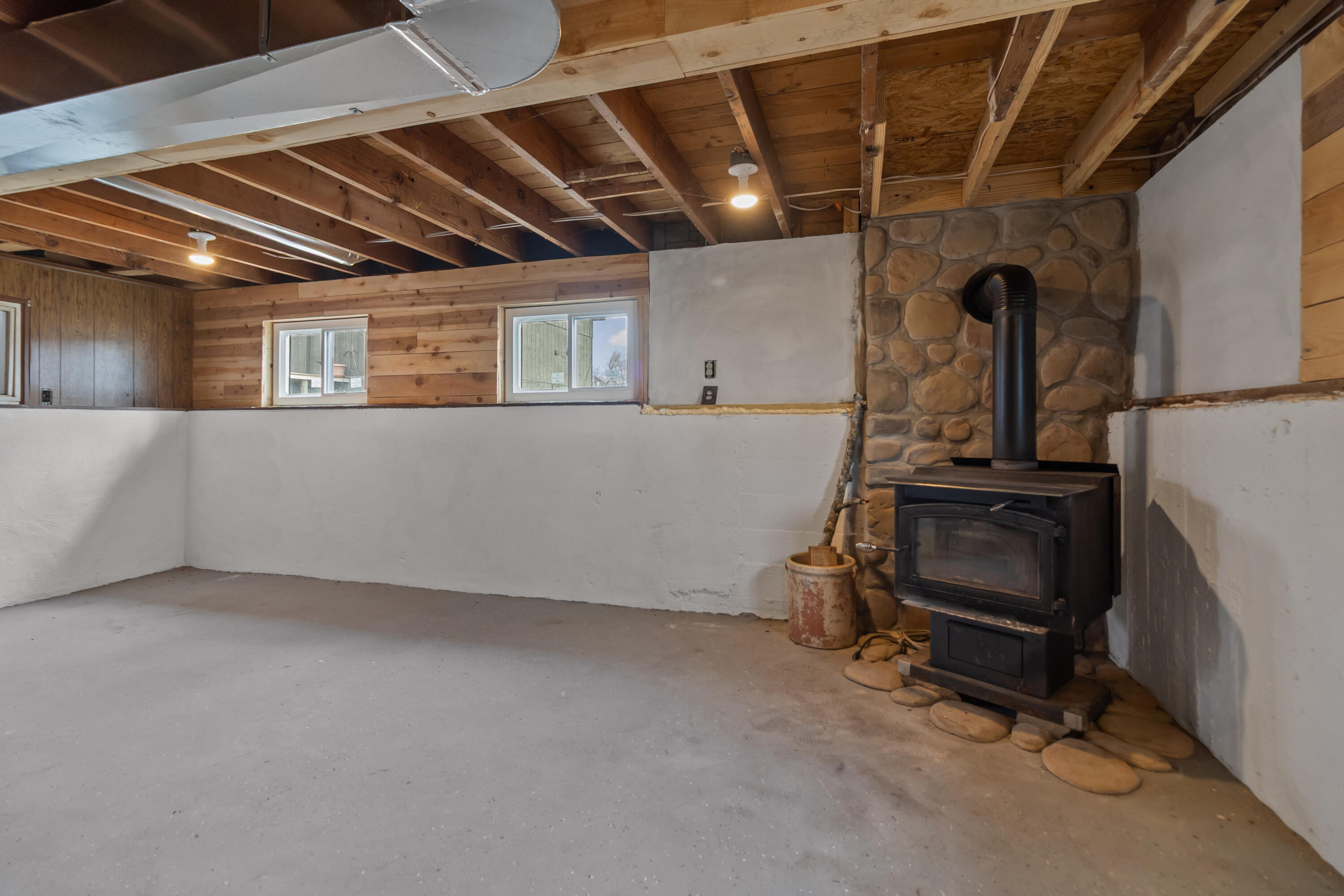 W6660 Willow Bend Road Walworth, WI 53184 - Photo 28 of 47 Basement stove