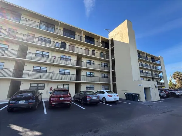 a cars parked in front of a building