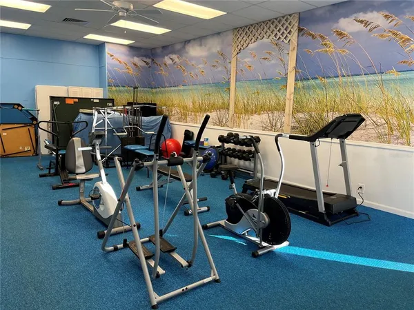 a view of a room with gym equipment