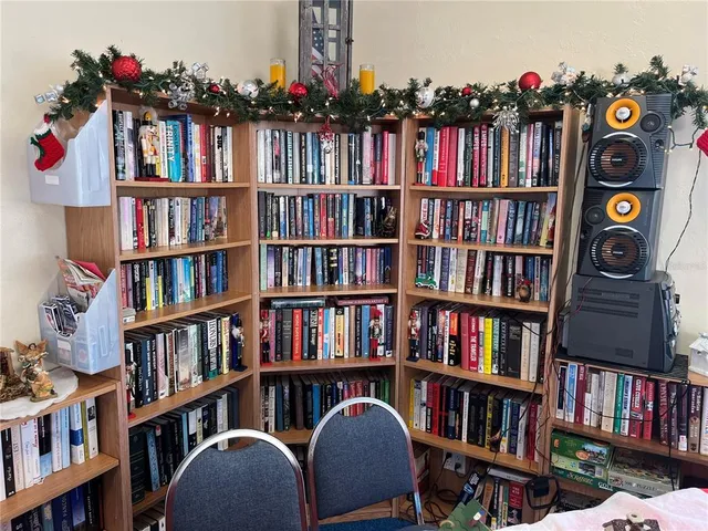 a book shelf with wooden floor a book shelf and a book shelf
